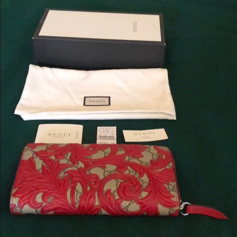 Gucci canvas/leather wallet like new  with tags